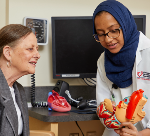 Doctor explaining heart function to patient