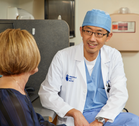 Doctor looking at patient