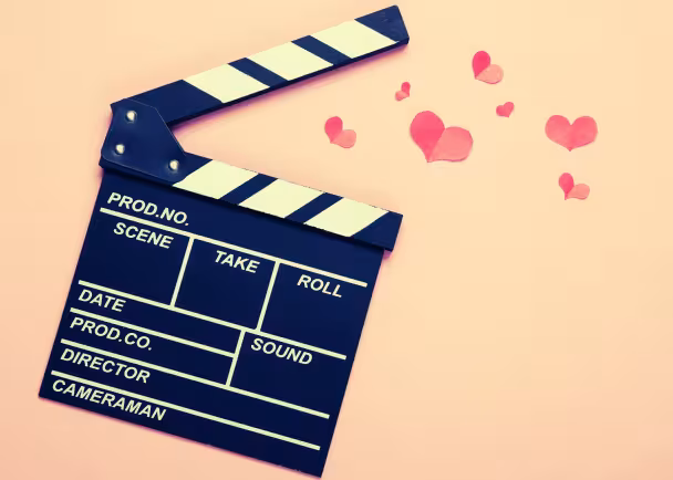 clapperboard with hearts