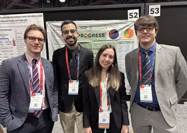 International scholars presenting posters at a national conference