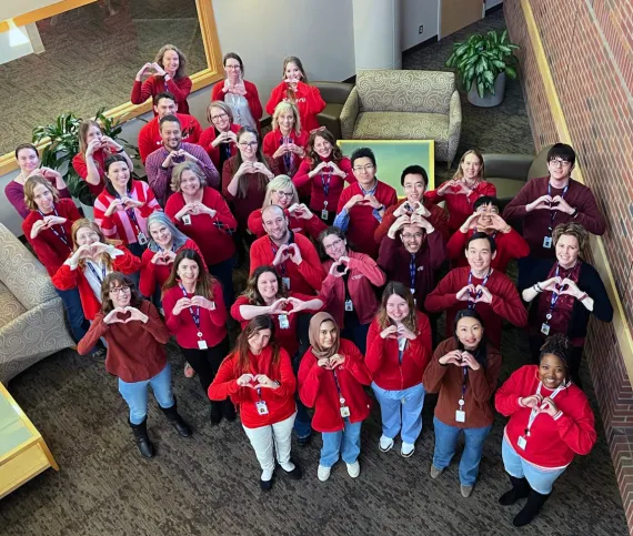 mhif staff holding hearts