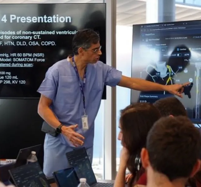Dr. Emmanouil Brilakis walking through cases during the CT for PCI Summit 3.0