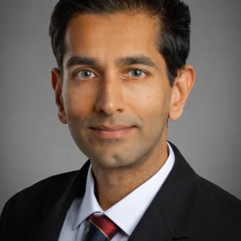headshot of Rizwan Attia, MBChB