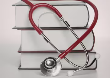 books and stethoscope